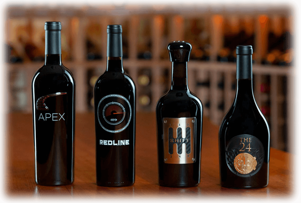 Cuatro botellas de Adobe Road Wines. Vinería estadounidense.